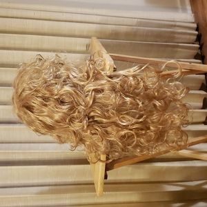 Partial wig blends with your own hair, very curly mid back length.